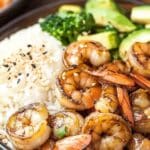 Shrimp in a skillet with soy garlic butter sauce