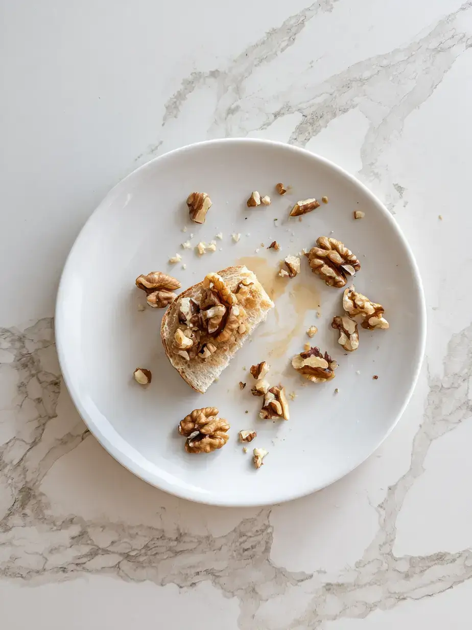 A bowl of perfectly toasted walnuts, golden brown and ready for your favorite recipe