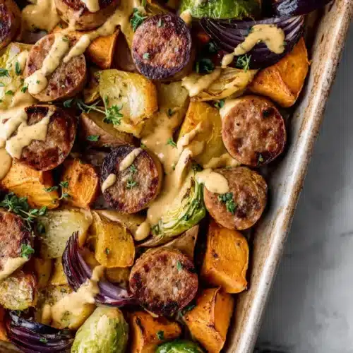 Easy autumn kielbasa sheet pan bake with creamy curry dijon sauce